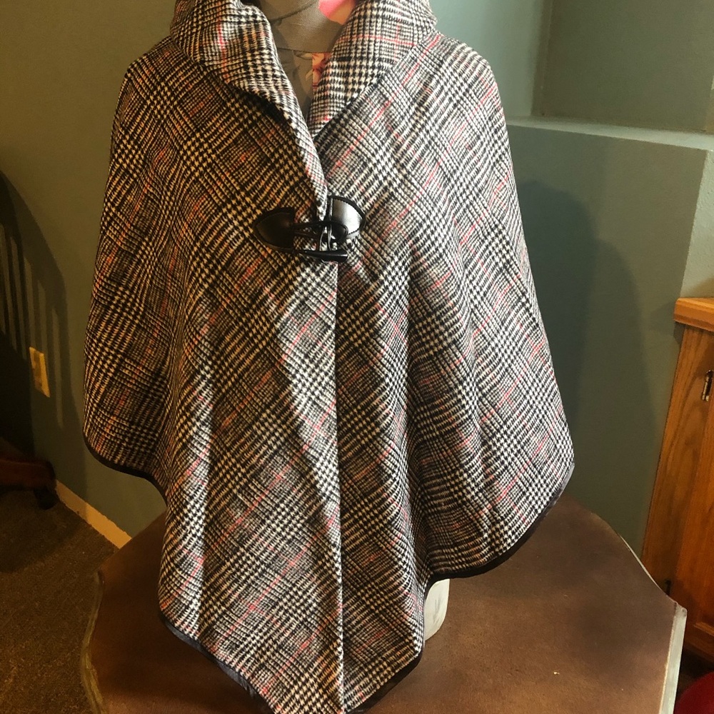 Plaid one size cape, shawl, button up.  Very soft